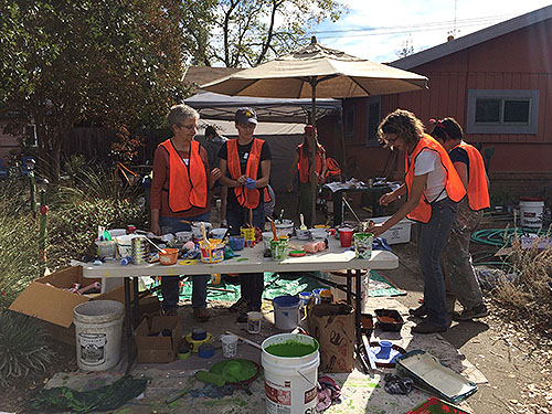 Community volunteers mixed and poured paint for all.