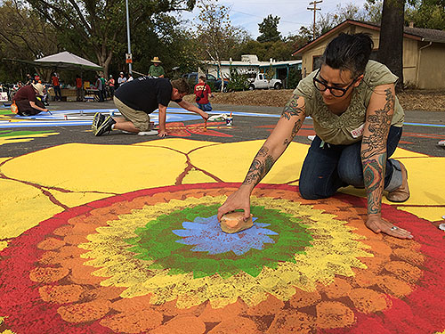 A sponge creates a perfect pattern for the sunflower center.