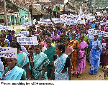 Woman marching for AIDS awareness in India, 2003.