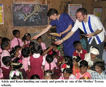 Adele and Koen passing out candy and pencils at a Mother Theresa school.