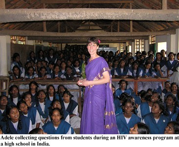 Adele collecting questions from high school students at an HIV awareness program.
