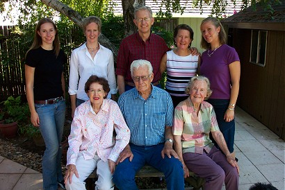 John Munn with parents, wife and daughers.